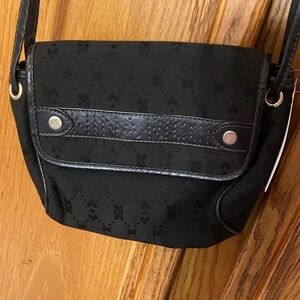 Elegant Black Nina Ricci Crossbody Bag